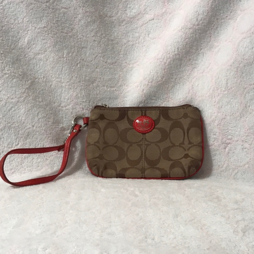 Brown and Red Coach Wristlet